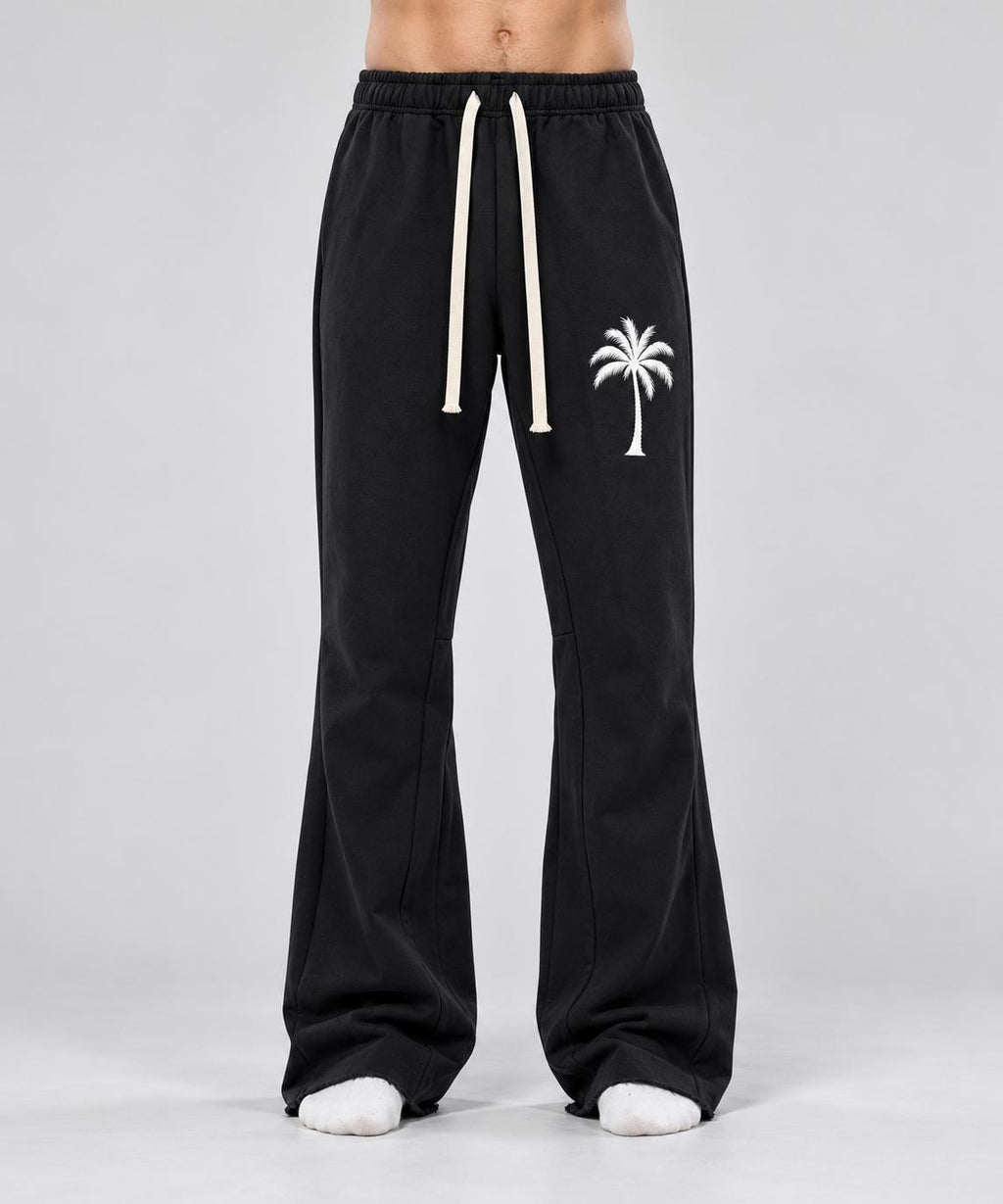 Black Palm Tree Sweatpants, White Paint Drip Graphic, Flared Raw Hem Pants