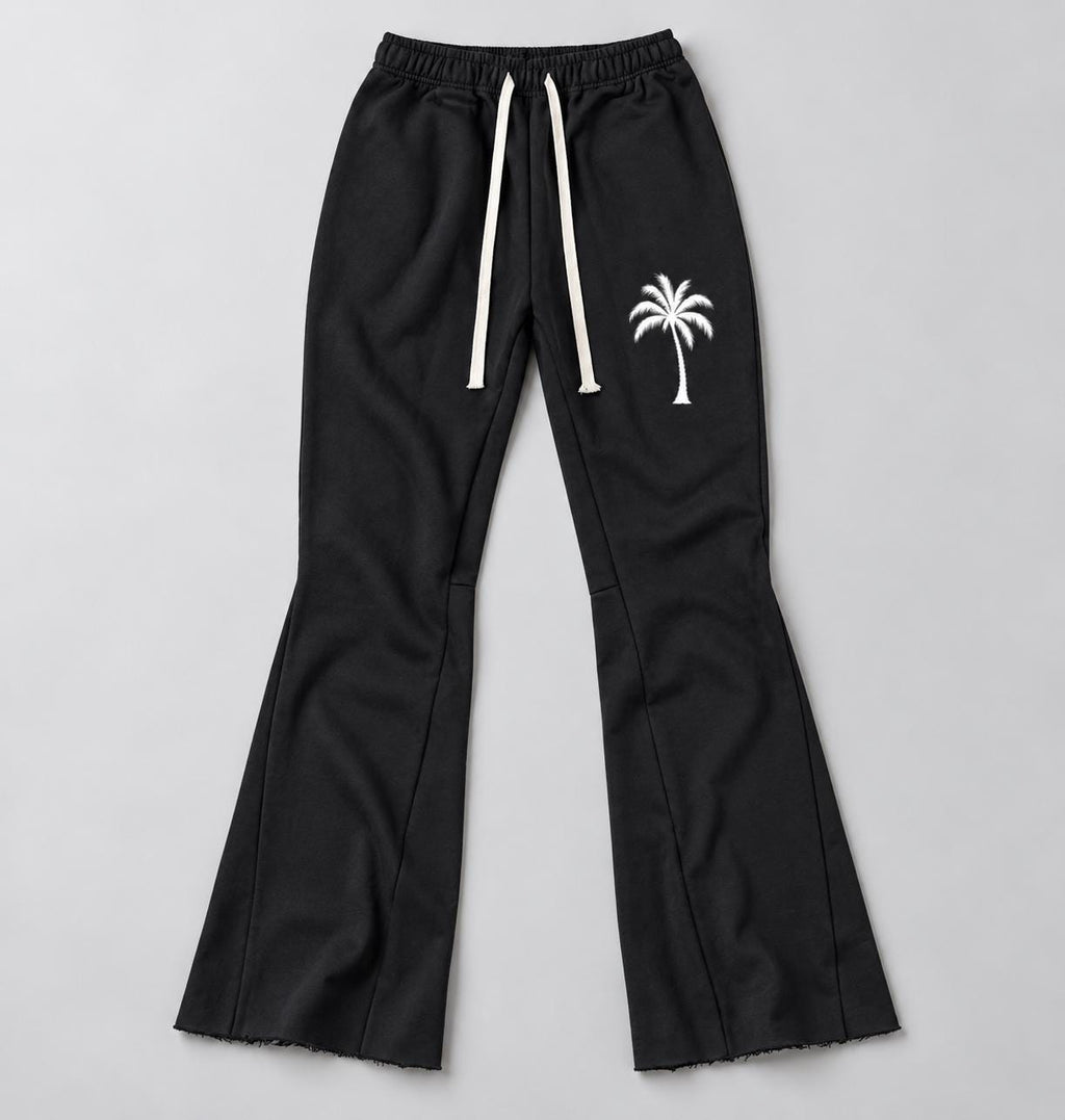 Black Palm Tree Sweatpants, White Paint Drip Graphic, Flared Raw Hem Pants