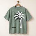 Sage Green Oversized Palm Tree Tee, Black Splatter Graphics, "God Is Good" Statement