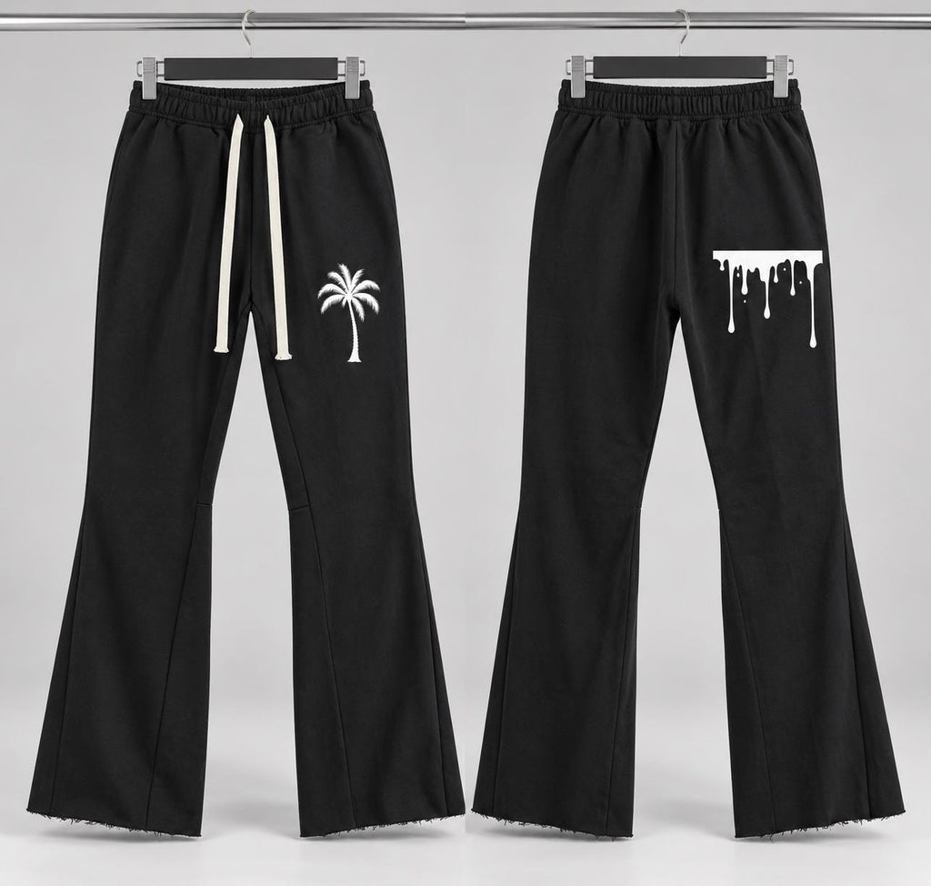 Black Palm Tree Sweatpants, White Paint Drip Graphic, Flared Raw Hem Pants