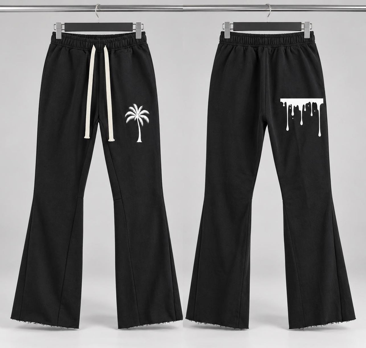 Black Palm Tree Sweatpants, White Paint Drip Graphic, Flared Raw Hem Pants